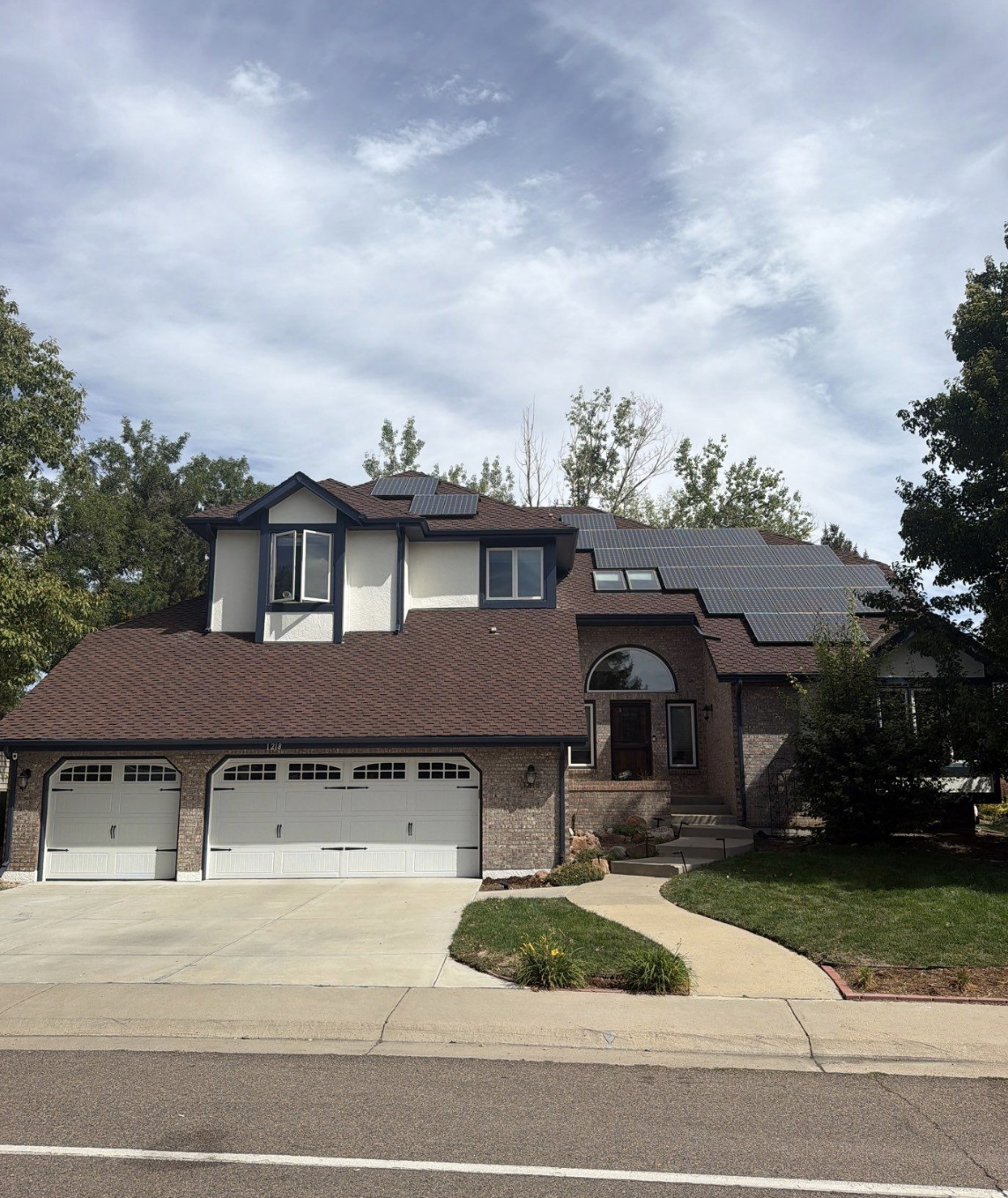 Completed Pure White and Navy exterior painting project in Eagle Trace Broomfield Colorado